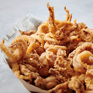 Chipirones braseados con cebolla caramelizada